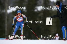 14.02.2008, Oestersund, Sweden (SWE): Sofia Domeij (SWE) gets information - IBU World Championchip of Biathlon, individual women - Oestersund (SWE). www.nordicfocus.com. c Manzoni/NordicFocus. Every downloaded picture is fee-liable.