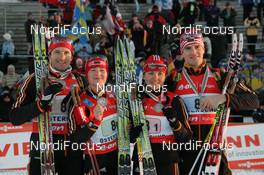 12.02.2008, Oestersund, Sweden (SWE): medal, Team Belarus, l-r Rustam Valiullin (BLR), Darya Domracheva (BLR), Liudmila Kalinchik (BLR), Sergey Novikov (BLR)  - IBU World Championchip of Biathlon, medal shooting - Oestersund (SWE). www.nordicfocus.com. c Hemmersbach/NordicFocus. Every downloaded picture is fee-liable.