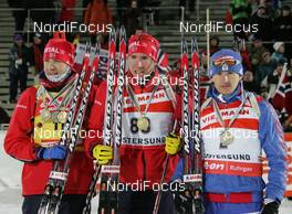 14.02.2008, Oestersund, Sweden (SWE): medal, l-r: Ole Einar Bjoerndalen (NOR), Emil Hegle Svendsen (NOR), Maxim Maksimov (RUS) - IBU World Championchip of Biathlon, medal shooting - Oestersund (SWE). www.nordicfocus.com. c Hemmersbach/NordicFocus. Every downloaded picture is fee-liable.