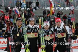 12.02.2008, Oestersund, Sweden (SWE): medal, Team Germany, l-r Michael Greis (GER), Andreas Birnbacher (GER), Magdalena Neuner (GER), Sabrina Buchholz (GER) - IBU World Championchip of Biathlon, medal shooting - Oestersund (SWE). www.nordicfocus.com. c Hemmersbach/NordicFocus. Every downloaded picture is fee-liable.