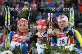 09.02.2008, Oestersund, Sweden (SWE): l-r: Albina Akhatova (RUS), Andrea Henkel (GER), Oksana Khvostenko (UKR) - IBU World Championchip of Biathlon, medal shooting - Oestersund (SWE). www.nordicfocus.com. c Manzoni/NordicFocus. Every downloaded picture is fee-liable.