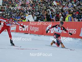 10.02.2008, Oestersund, Sweden (SWE): Group, l-r Tomasz Sikora (POL), Tim Burke (USA), fight on the finish line - IBU World Championchip of Biathlon, pursuit men - Oestersund (SWE). www.nordicfocus.com. c Hemmersbach/NordicFocus. Every downloaded picture is fee-liable.