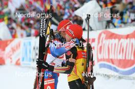 10.02.2008, Oestersund, Sweden (SWE): l-r: Ekaterina Iourieva (RUS) and Andrea Henkel (GER) - IBU World Championchip of Biathlon, pursuit women - Oestersund (SWE). www.nordicfocus.com. c Manzoni/NordicFocus. Every downloaded picture is fee-liable.
