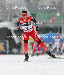 01.01.08, Nove Mesto, Czech Republic (CZE): Dario Cologna (SUI)  - FIS world cup cross-country, tour de ski, 15 km men handicap start, Nove Mesto (CZE). www.nordicfocus.com. c Hemmersbach/NordicFocus. Every downloaded picture is fee-liable.