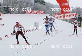 01.01.08, Nove Mesto, Czech Republic (CZE): group, final fight l-r Lukas Bauer (CZE), Pietro Piller Cottrer (ITA), Martin Koukal (CZE)  - FIS world cup cross-country, tour de ski, 15 km men handicap start, Nove Mesto (CZE). www.nordicfocus.com. c Hemmersbach/NordicFocus. Every downloaded picture is fee-liable.