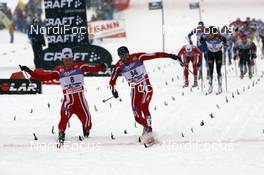 05.01.08, Val di Fiemme, Italy (ITA): l-r: Jens Arne Svartedal (NOR), Odd-Bjoern Hjelmeset (NOR)  - FIS world cup cross-country, tour de ski, mass men, Val di Fiemme (ITA). www.nordicfocus.com. c Felgenhauer/NordicFocus. Every downloaded picture is fee-liable.