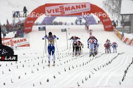 05.01.08, Val di Fiemme, Italy (ITA):  Virpi Kuitunen (FIN) leading the race at the finish line - FIS world cup cross-country, tour de ski, mass women, Val di Fiemme (ITA). www.nordicfocus.com. c Felgenhauer/NordicFocus. Every downloaded picture is fee-liable.