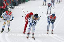 05.01.08, Val di Fiemme, Italy (ITA): group, in front Virpi Kuitunen (FIN), behind, l-r Charlotte Kalla (SWE), Justyna Kowalczyk (POL), Aino Kaisa Saarinen (FIN)  - FIS world cup cross-country, tour de ski, mass women, Val di Fiemme (ITA). www.nordicfocus.com. c Hemmersbach/NordicFocus. Every downloaded picture is fee-liable.