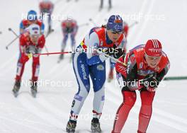 05.01.08, Val di Fiemme, Italy (ITA): group, in front Seraina Mischol (SUI), behind Riitta Liisa Roponen (FIN)  - FIS world cup cross-country, tour de ski, mass women, Val di Fiemme (ITA). www.nordicfocus.com. c Hemmersbach/NordicFocus. Every downloaded picture is fee-liable.