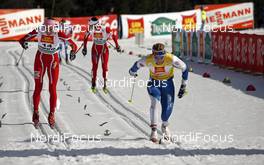 15.03.2008, Bormio, Italy (ITA): l-r: Justyna Kowalczyk (POL), Virpi Kuitunen (FIN)  - FIS world cup cross-country, 10km mass women, Bormio (ITA). www.nordicfocus.com. c Felgenhauer/NordicFocus. Every downloaded picture is fee-liable.