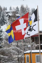 12.12.2008, Davos, Switzerland (SUI): flags in the wind- FIS world cup cross-country, training, Davos (SUI). www.nordicfocus.com. © Casanova/NordicFocus. Every downloaded picture is fee-liable.