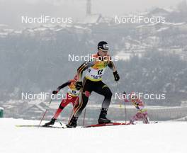 13.01.2008, Val di Fiemme, Italy (ITA): l-r: Michael Hollenstein (SUI), Matthias Menz (GER), Norihito Kobayashi (JPN)  - FIS world cup nordic combined, sprint, Val di Fiemme (ITA). www.nordicfocus.com. c Felgenhauer/NordicFocus. Every downloaded picture is fee-liable.
