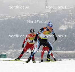 13.01.2008, Val di Fiemme, Italy (ITA): l-r: Alfred Rainer (AUT), Hannu Manninen (FIN) - FIS world cup nordic combined, sprint, Val di Fiemme (ITA). www.nordicfocus.com. c Felgenhauer/NordicFocus. Every downloaded picture is fee-liable.