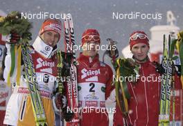 20.12.2008, Ramsau, Austria (AUT): winner l-r: Bjoern Kircheisen (GER), Fischer, Rottefella, Bill Demong (USA), Atomic, Jan Schmid (NOR), Fischer, Rottefella - FIS world cup nordic combined, individual gundersen HS98/10km, Ramsau (AUT). www.nordicfocus.com. © Furtner/NordicFocus. Every downloaded picture is fee-liable.