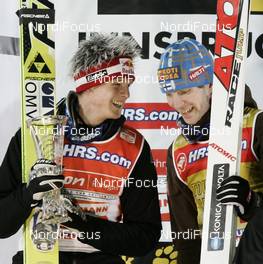 05.01.2008, Bischofshofen, Austria (AUT): l-r: Thomas Morgenstern (AUT), winner Janne Ahonen (FIN) - FIS world cup ski jumping, four hills tournament, individual HS140, Bischofshofen (AUT) - replaced from Innsbruck. www.nordicfocus.com. c Furtner/NordicFocus. Every downloaded picture is fee-liable.