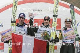 16.03.2008, Planica, Slovakia (SLO): l-r: Martin Koch (AUT), Gregor Schlierenzauer (AUT), Janne Happonen (FIN) - FIS world ski jumping, individual HS215, Planica (SLO). www.nordicfocus.com. c Furtner/NordicFocus. Every downloaded picture is fee-liable.