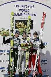 23.02.2008, Oberstdorf, Germany (GER): l-r: Martin Koch (AUT), Gregor Schlierenzauer (AUT), Janne Ahonen (FIN) - FIS world championship ski flying, individual HS213, Oberstdorf (GER). www.nordicfocus.com. c Furtner/NordicFocus. Every downloaded picture is fee-liable.