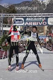 27.01.2008, Molina di Fiemme, Italy (ITA): l-r: Anders Aukland (NOR) and Jorgen Aukland (NOR) celebrating at the finish - Worldloppet Marcialonga, Molina di Fiemme (ITA). www.nordicfocus.com. c Felgenhauer/NordicFocus. Every downloaded picture is fee-liable.