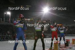 08.01.2009, Oberhof, Germany (GER): Dmitri Iarochenko (RUS), Madshus, Rottefella, Swix, adidas, Arnd Peiffer (GER), Dominik Landertinger (AUT), Fischer, Rottefella, Leki - IBU world cup biathlon, relay men, Oberhof (GER). www.nordicfocus.com. © Manzoni/NordicFocus. Every downloaded picture is fee-liable.