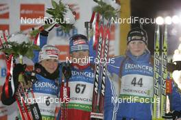 09.01.2009, Oberhof, Germany (GER): l-r: Andrea Henkel (GER), Atomic, Exel, adidas, Toko, Ekaterina Iourieva (RUS), Madshus, Rottefella, Swix, adidas, Helena Jonsson (SWE), Fischer, Rottefella, Leki, adidas - IBU world cup biathlon, sprint women, Oberhof (GER). www.nordicfocus.com. © Manzoni/NordicFocus. Every downloaded picture is fee-liable.