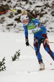 18.01.2009, Ruhpolding, Germany (GER): Marie Dorin (FRA), Rossignol, Rottefella, Exel, Odlo - IBU world cup biathlon, pursuit women, Ruhpolding (GER). www.nordicfocus.com. © Manzoni/NordicFocus. Every downloaded picture is fee-liable.