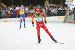 18.01.2009, Ruhpolding, Germany (GER): Chunli Wang (CHN), Fischer, Salomon, Swix, adidas  - IBU world cup biathlon, pursuit women, Ruhpolding (GER). www.nordicfocus.com. © Manzoni/NordicFocus. Every downloaded picture is fee-liable.