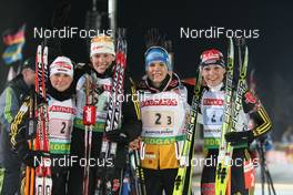 14.01.2009, Ruhpolding, Germany (GER): l-r: Andrea Henkel (GER), Atomic, Exel, adidas, Toko, Kati Wilhelm (GER), Madshus, Rottefella, Swix, adidas, Kathrin Hitzer (GER), Fischer, Rottefella, Madshus, Leki, adidas, Magdalena Neuner (GER), Fischer, Rottefella, Exel, adidas - IBU world cup biathlon, relay women, Ruhpolding (GER). www.nordicfocus.com. © Manzoni/NordicFocus. Every downloaded picture is fee-liable.