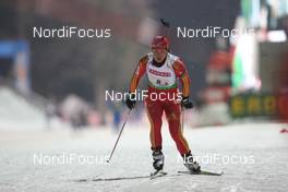 14.01.2009, Ruhpolding, Germany (GER): Xue Dong (CHN), Fischer, Salomon, Swix, adidas - IBU world cup biathlon, relay women, Ruhpolding (GER). www.nordicfocus.com. © Manzoni/NordicFocus. Every downloaded picture is fee-liable.