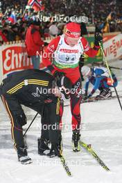 14.01.2009, Ruhpolding, Germany (GER): Norbert Baier (GER), IBU head TD, Tora Berger (NOR), Fischer, Rottefella, Odlo - IBU world cup biathlon, relay women, Ruhpolding (GER). www.nordicfocus.com. © Manzoni/NordicFocus. Every downloaded picture is fee-liable.