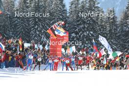 25.01.2009, Antholz, Italy (ITA): The field through the crowd - IBU world cup biathlon, mass men, Antholz (ITA). www.nordicfocus.com. © Manzoni/NordicFocus. Every downloaded picture is fee-liable.
