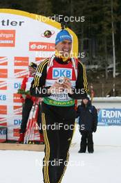 13.03.2009, Vancouver, Canada (CAN): "Photographer" Michael Greis (GER), Madshus, Rottefella, Exel, adidas - IBU world cup biathlon, sprint men, Vancouver (CAN). www.nordicfocus.com. © Manzoni/NordicFocus. Every downloaded picture is fee-liable.
