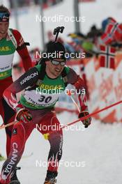 22.03.2009, Trondheim, Norway (NOR): Jean Philippe Leguellec (CAN), Rossignol, Rottefella, Exel - IBU world cup biathlon, mass men, Trondheim (NOR). www.nordicfocus.com. © Manzoni/NordicFocus. Every downloaded picture is fee-liable.