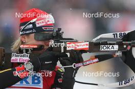 22.03.2009, Trondheim, Norway (NOR): Magdalena Neuner (GER), Fischer, Rottefella, Exel, adidas - IBU world cup biathlon, mass women, Trondheim (NOR). www.nordicfocus.com. © Manzoni/NordicFocus. Every downloaded picture is fee-liable.