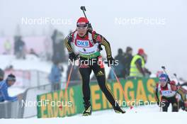 22.03.2009, Trondheim, Norway (NOR): Magdalena Neuner (GER), Fischer, Rottefella, Exel, adidas - IBU world cup biathlon, mass women, Trondheim (NOR). www.nordicfocus.com. © Manzoni/NordicFocus. Every downloaded picture is fee-liable.