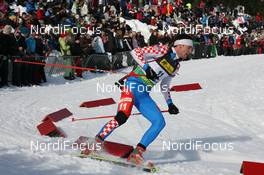 19.03.2009, Trondheim, Norway (NOR): Jakov Fak (CRO), Fischer, Rottefella, Alpina, Exel - IBU world cup biathlon, sprint men, Trondheim (NOR). www.nordicfocus.com. © Manzoni/NordicFocus. Every downloaded picture is fee-liable.