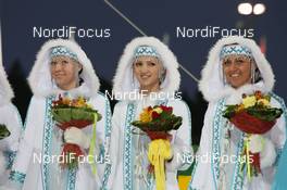 27.03.2009, Khanty-Mansiysk, Russia (RUS): Biathlon Feature: ceremony girls - IBU world cup biathlon, sprint women, Khanty-Mansiysk (RUS). www.nordicfocus.com. © Manzoni/NordicFocus. Every downloaded picture is fee-liable.