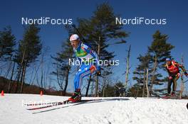 17.02.2009, Pyeong Chang, Korea (KOR): Maxim Tchoudov (RUS), Madshus, Rottefella, adidas and Michael Greis (GER), Madshus, Rottefella, Exel, adidas - IBU world championships biathlon, individual men, Pyeong Chang (KOR). www.nordicfocus.com. © Manzoni/NordicFocus. Every downloaded picture is fee-liable.