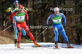 17.02.2009, Pyeong Chang, Korea (KOR): Maxim Tchoudov (RUS), Madshus, Rottefella, adidas and Matthias Simmen (SUI), Rossignol, Rottefella, Exel, adidas - IBU world championships biathlon, individual men, Pyeong Chang (KOR). www.nordicfocus.com. © Manzoni/NordicFocus. Every downloaded picture is fee-liable.