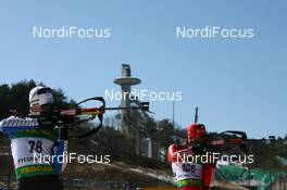 17.02.2009, Pyeong Chang, Korea (KOR): Peter Dokl (SLO), Atomic, Rottefella, Alpina, Exel and Claudio Boeckli (SUI), Rossignol, Rottefella, Leki, adidas - IBU world championships biathlon, individual men, Pyeong Chang (KOR). www.nordicfocus.com. © Manzoni/NordicFocus. Every downloaded picture is fee-liable.
