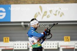17.02.2009, Pyeong Chang, Korea (KOR): Vincent Defrasne (FRA), Rossignol, Rottefella, One Way, Odlo while zeroing - IBU world championships biathlon, individual men, Pyeong Chang (KOR). www.nordicfocus.com. © Felgenhauer/NordicFocus. Every downloaded picture is fee-liable.