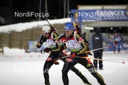 15.02.2009, Pyeong Chang, Korea (KOR): l-r:  Michael Roesch (GER), Fischer, Rottefella, Exel, adidas, Toko, Michael Greis (GER), Madshus, Rottefella, Exel, adidas  - IBU world championships biathlon, pursuit men, Pyeong Chang (KOR). www.nordicfocus.com. © Felgenhauer/NordicFocus. Every downloaded picture is fee-liable.