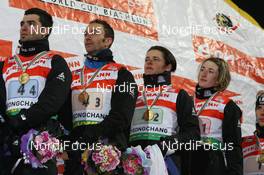 19.02.2009, Pyeong Chang, Korea (KOR): l-r: Simon Fourcade (FRA), Fischer, Rottefella, Swix, Odlo, Vincent Defrasne (FRA), Atomic, Rottefella, One Way, Odlo, Sylvie Becaert (FRA), Fischer, Rottefella, Exel, Odlo, Marie Laure Brunet (FRA), Rossignol, Rottefella, Swix, Odlo - IBU world championships biathlon, relay mixed, Pyeong Chang (KOR). www.nordicfocus.com. © Manzoni/NordicFocus. Every downloaded picture is fee-liable.