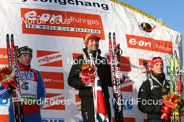 14.02.2009, Pyeong Chang, Korea (KOR): l-r: Maxim Tchoudov (RUS), Madshus, Rottefella, adidas, Ole Einar Bjoerndalen (NOR), Madshus, Rottefella, Odlo, Alexander Os (NOR), Fischer, Rottefella, Swix, Odlo - IBU world championships biathlon, sprint men, Pyeong Chang (KOR). www.nordicfocus.com. © Manzoni/NordicFocus. Every downloaded picture is fee-liable.
