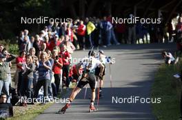 26.09.2009, Oberhof (GER): athletes in the uphill, spectators - IBU Sommer Biathlon Worldchampionship, sprint men - Oberhof (GER). www.nordicfocus.com. © NordicFocus. Every downloaded picture is fee-liable.
