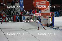 05.12.2009, Oestersund, Sweden (SWE): Markus Windisch (ITA), Fischer, Rottefella, Alpina, Leki finishes - IBU world cup biathlon, sprint men, Oestersund (SWE). www.nordicfocus.com. © NordicFocus. Every downloaded picture is fee-liable.