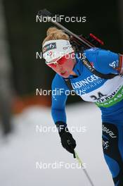 05.12.2009, Oestersund, Sweden (SWE): Marie Dorin (FRA), Rossignol, Rottefella, Exel, Odlo - IBU world cup biathlon, sprint women, Oestersund (SWE). www.nordicfocus.com. © NordicFocus. Every downloaded picture is fee-liable.