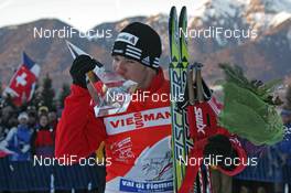 04.01.2009, Val di Fiemme, Italy (ITA): Tds winner overall Dario Cologna (SUI), Fischer, Rottefella, Alpina, Swix, adidas  - FIS world cup cross-country, tour de ski, final climb men, Val di Fiemme (ITA). www.nordicfocus.com. © Hemmersbach/NordicFocus. Every downloaded picture is fee-liable.