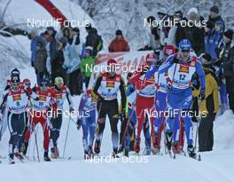 03.01.2009, Val di Fiemme, Italy (ITA): group, in front Evgenji Dementiev (RUS), Madshus, Salomon, Swix, adidas , behind Lukas Bauer (CZE), Fischer, Rottefella, Alpina, Swix, Toko, Dario Cologna (SUI), Fischer, Rottefella, Alpina, Swix, adidas, Axel Teichmann (GER), Madshus, Rottefella, Swix, adidas, Toko  - FIS world cup cross-country, tour de ski, mass men, Val di Fiemme (ITA). www.nordicfocus.com. © Hemmersbach/NordicFocus. Every downloaded picture is fee-liable.
