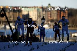18.03.2009, Stockholm, Sweden (SWE): athletes in front of Stockholm  - FIS world cup cross-country, individual sprint, Stockholm (SWE). www.nordicfocus.com. © Felgenhauer/NordicFocus. Every downloaded picture is fee-liable.