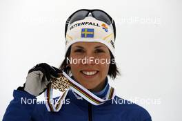 20.03.2009, Falun, Sweden (SWE): Charlotte Kalla (SWE), Fischer, Salomon, Swix, Craft  - FIS world cup cross-country, cups, Falun (SWE). www.nordicfocus.com. © Felgenhauer/NordicFocus. Every downloaded picture is fee-liable.